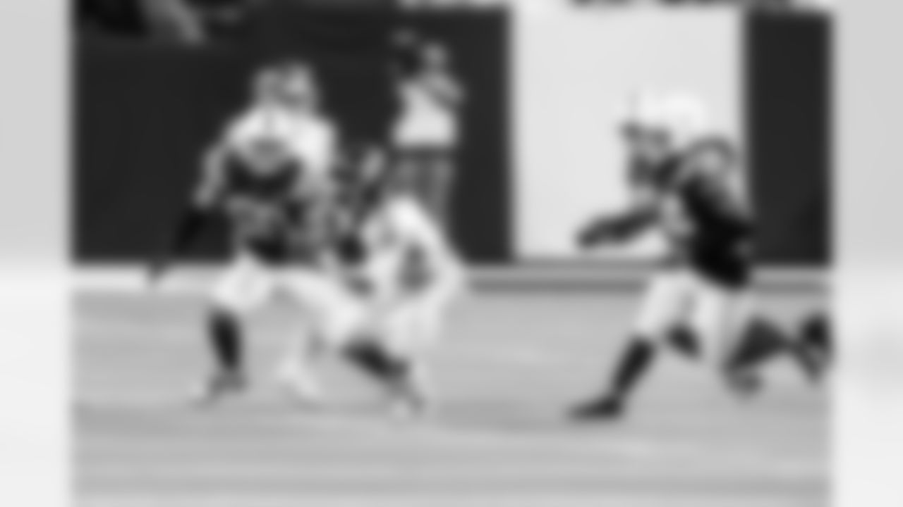 LB Austin Ajiake #58 and LB Buddy Johnson #59