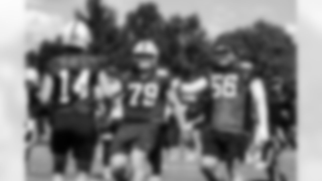 WR Alec Pierce #14, T Bernhard Raimann #79 and G Quenton Nelson #56