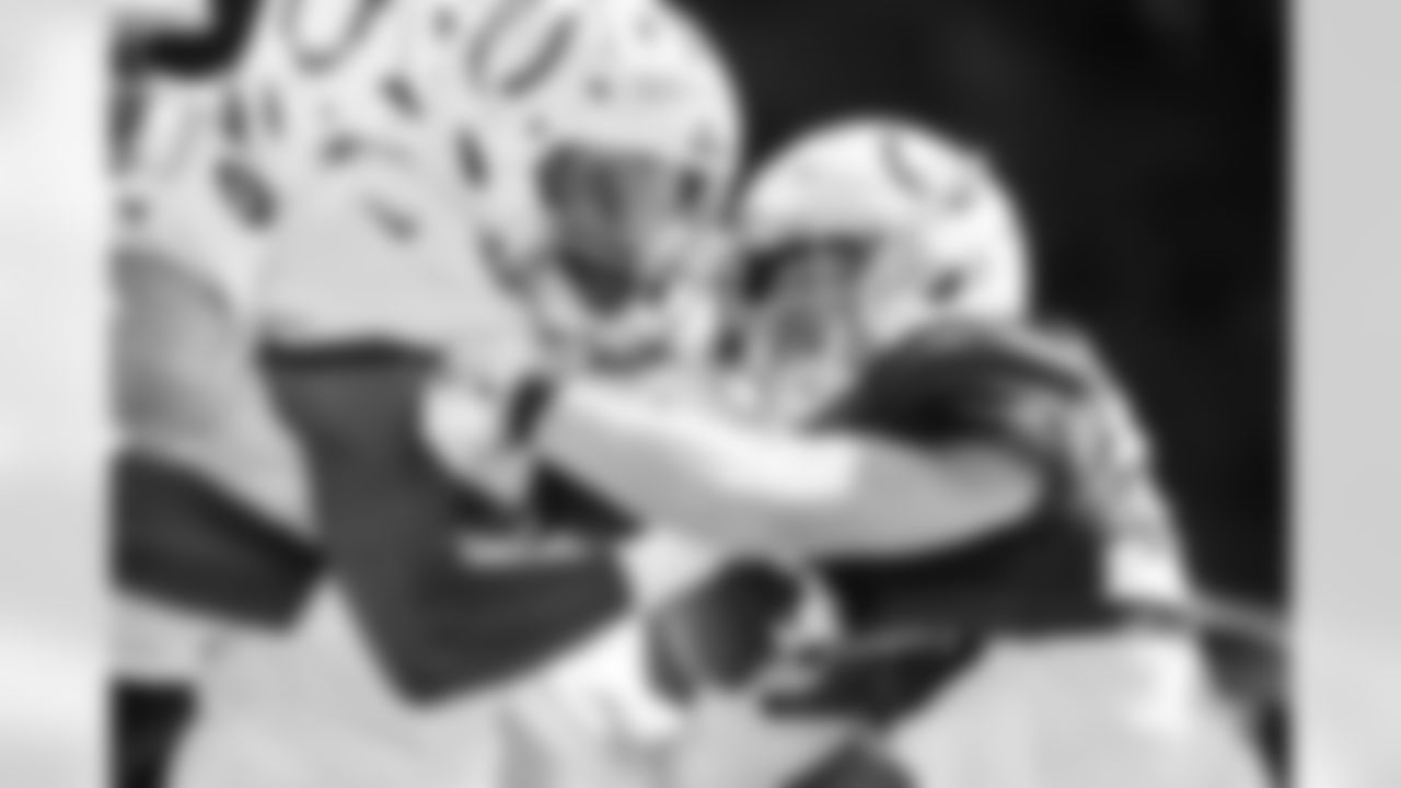 RB DJ Giddens #21 and S Hunter Wohler #30