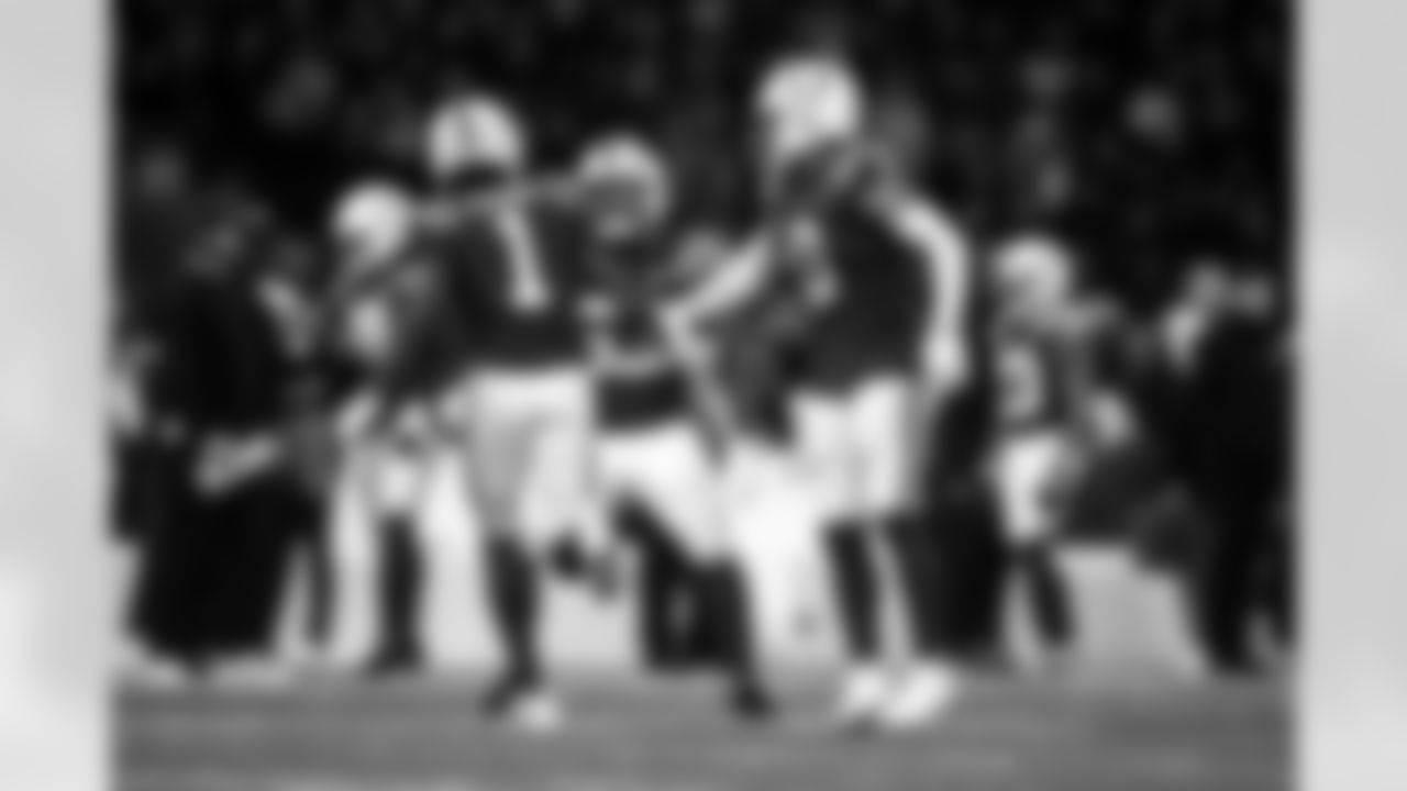 CB Sauce Gardner#1, S Camryn Bynum #0 and LB Germaine Pratt #53