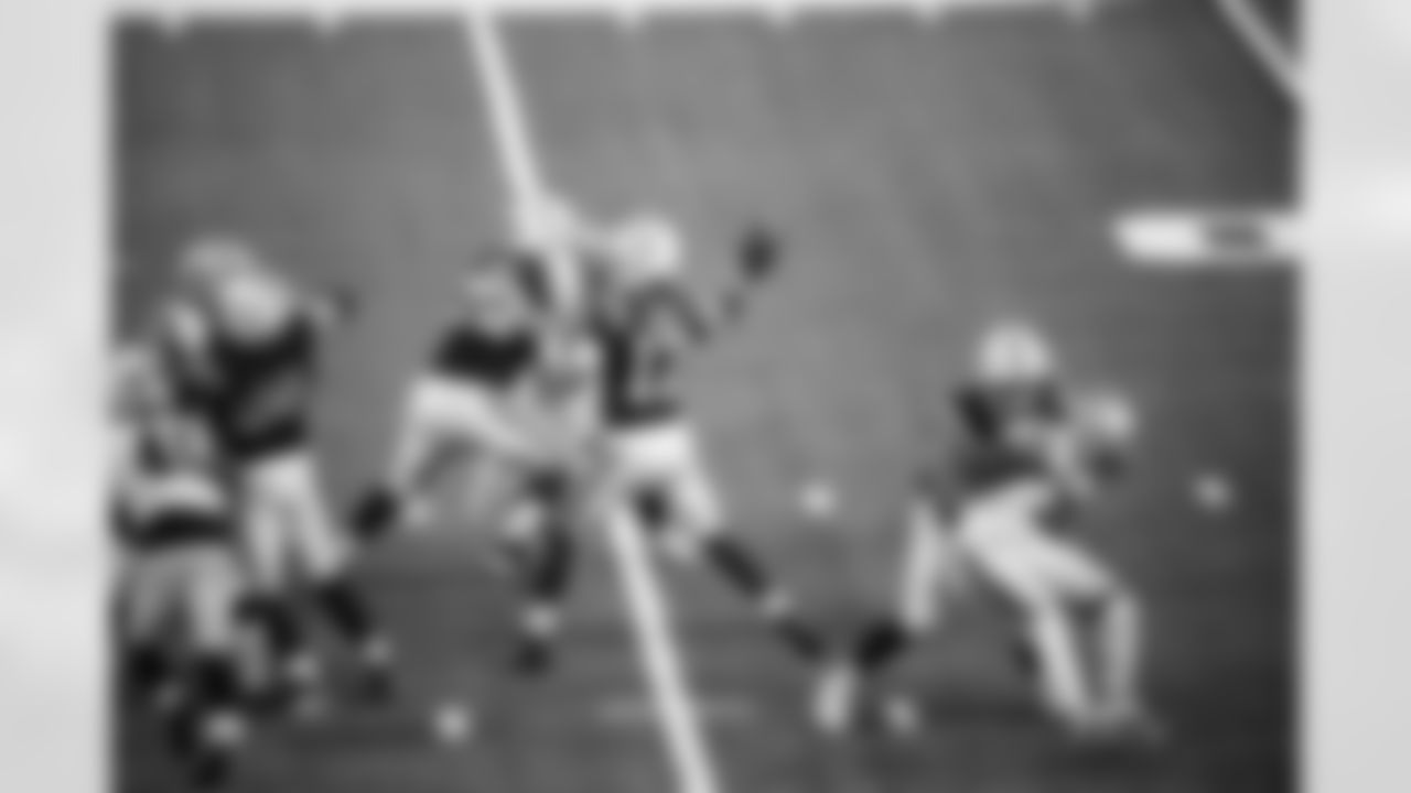 G Quenton Nelson #56, T Braden Smith #72 and QB Daniel Jones #17