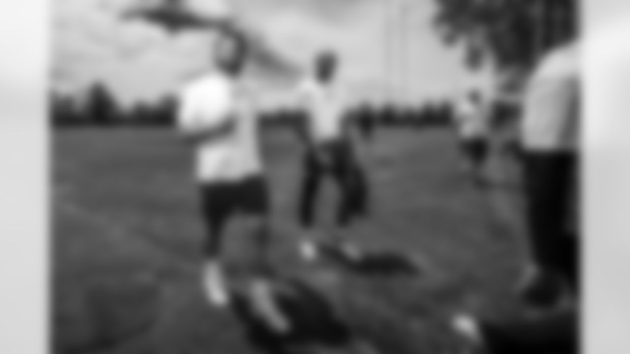 G Tanor Bortolini #60, Blayne Taylor and G Josh Sills #65