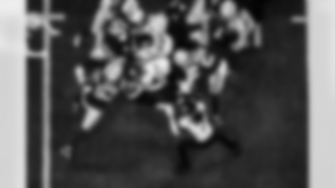 LB Germaine Pratt #53, DT Grover Stewart #90 and CB Kenny Moore II #23