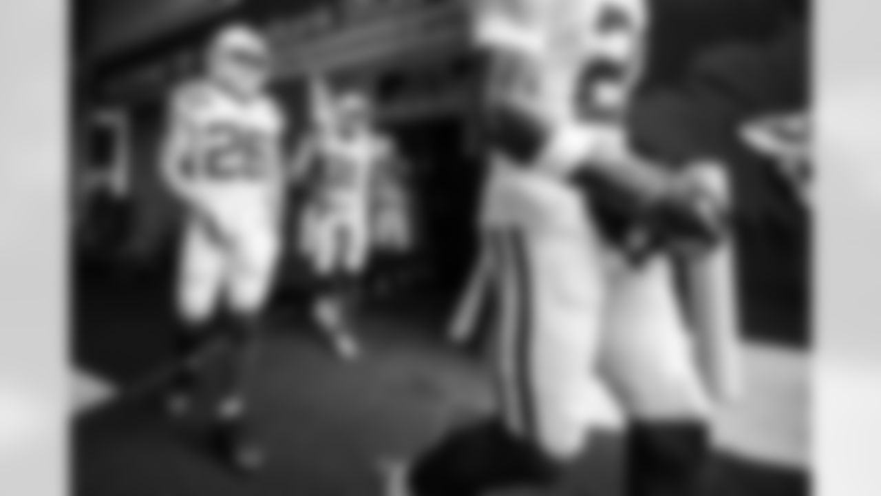 RB Evan Hull #26, RB Evan Hull #26 and RB Tyler Goodson #31