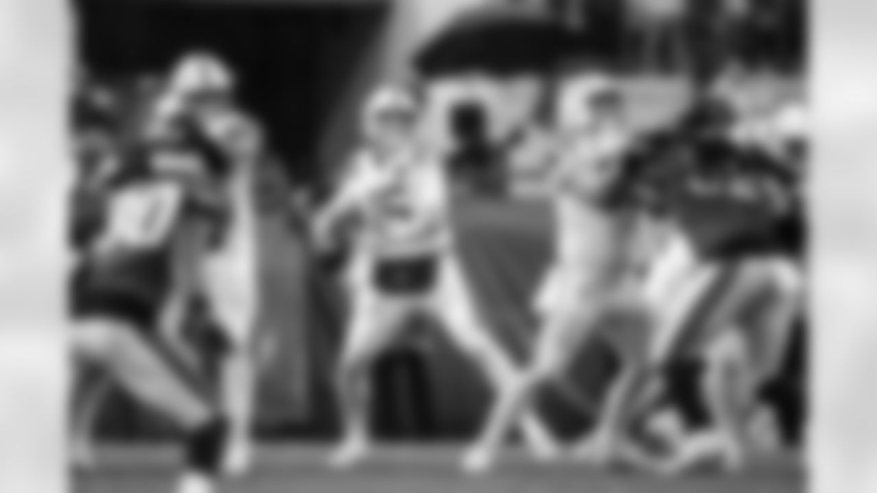 G Matt Goncalves #71, QB Riley Leonard #15 and C Tanor Bortolini #60