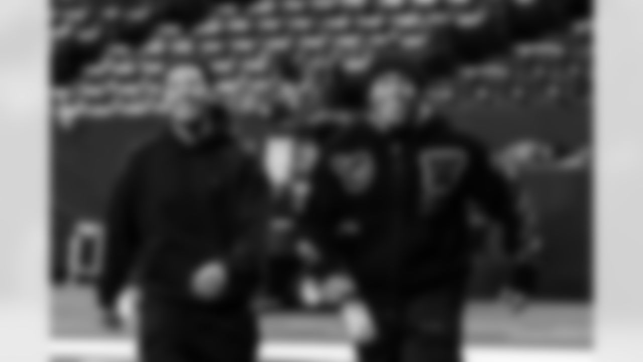 S Camryn Bynum #0 and RB Jonathan Taylor #28