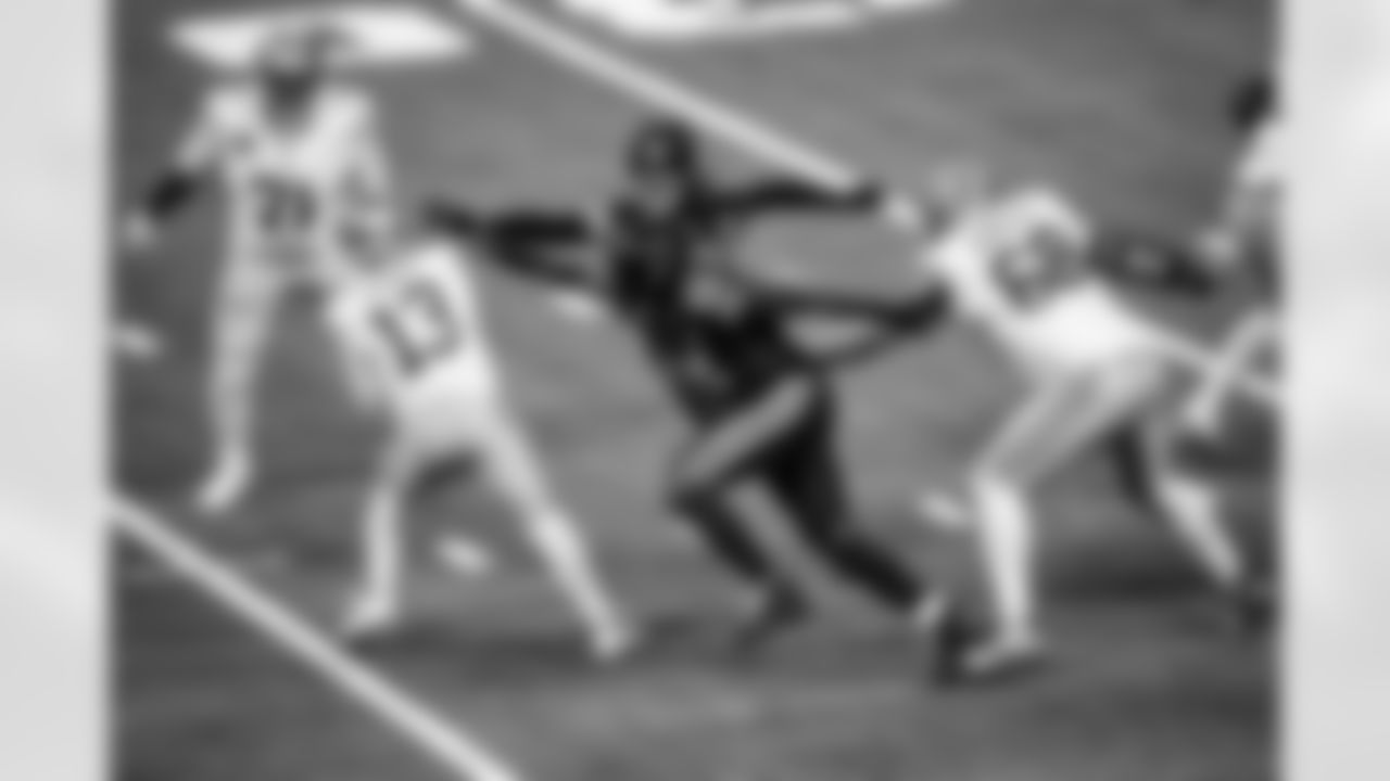 DE Laiatu Latu #97 and DE Tyquan Lewis #94