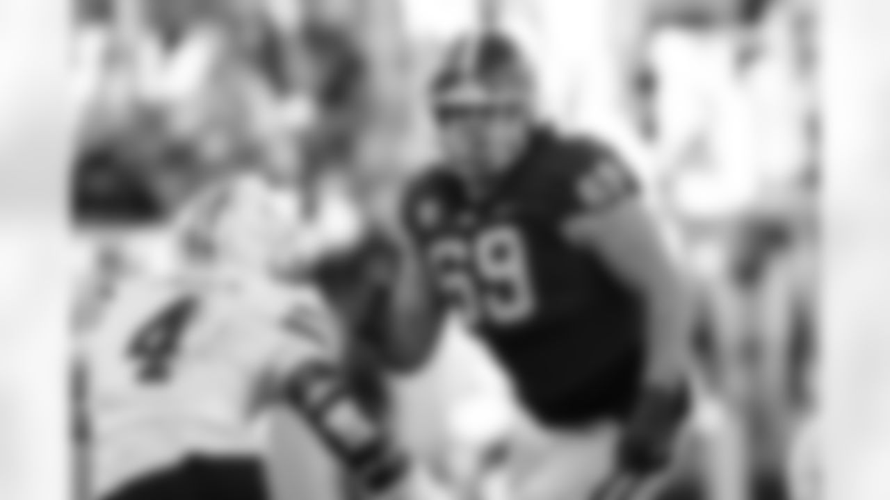 Georgia offensive lineman Tate Ratledge (69) is shown in action during the second half of an NCAA college football game against UMass, Saturday, Nov. 23, 2024, in Athens, Ga. (AP Photo/John Bazemore)