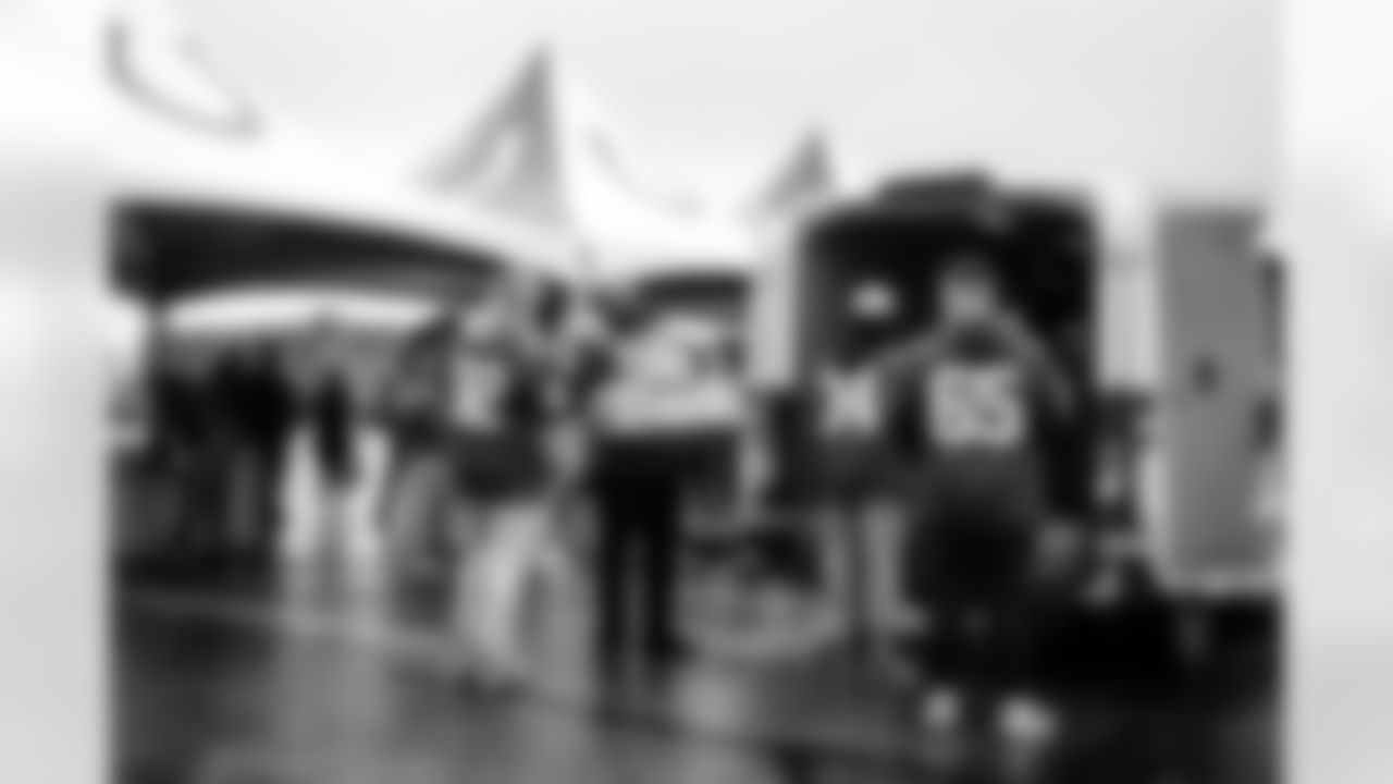 DT Neville Gallimore #92, DT Grover Stewart #90, S Ben Nikkel #34 and C Jimmy Morrissey #65