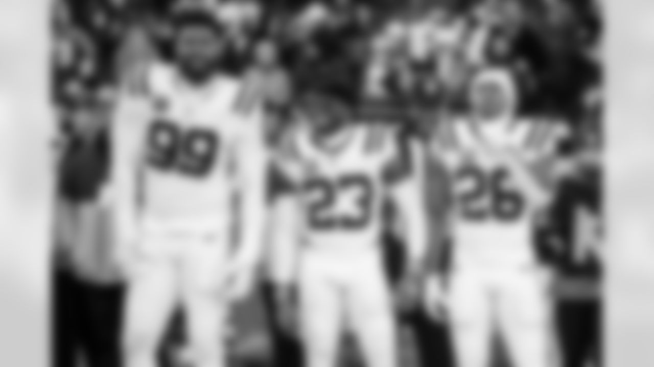 DT DeForest Buckner #99, CB Kenny Moore II #23 and RB Jonathan Taylor #28