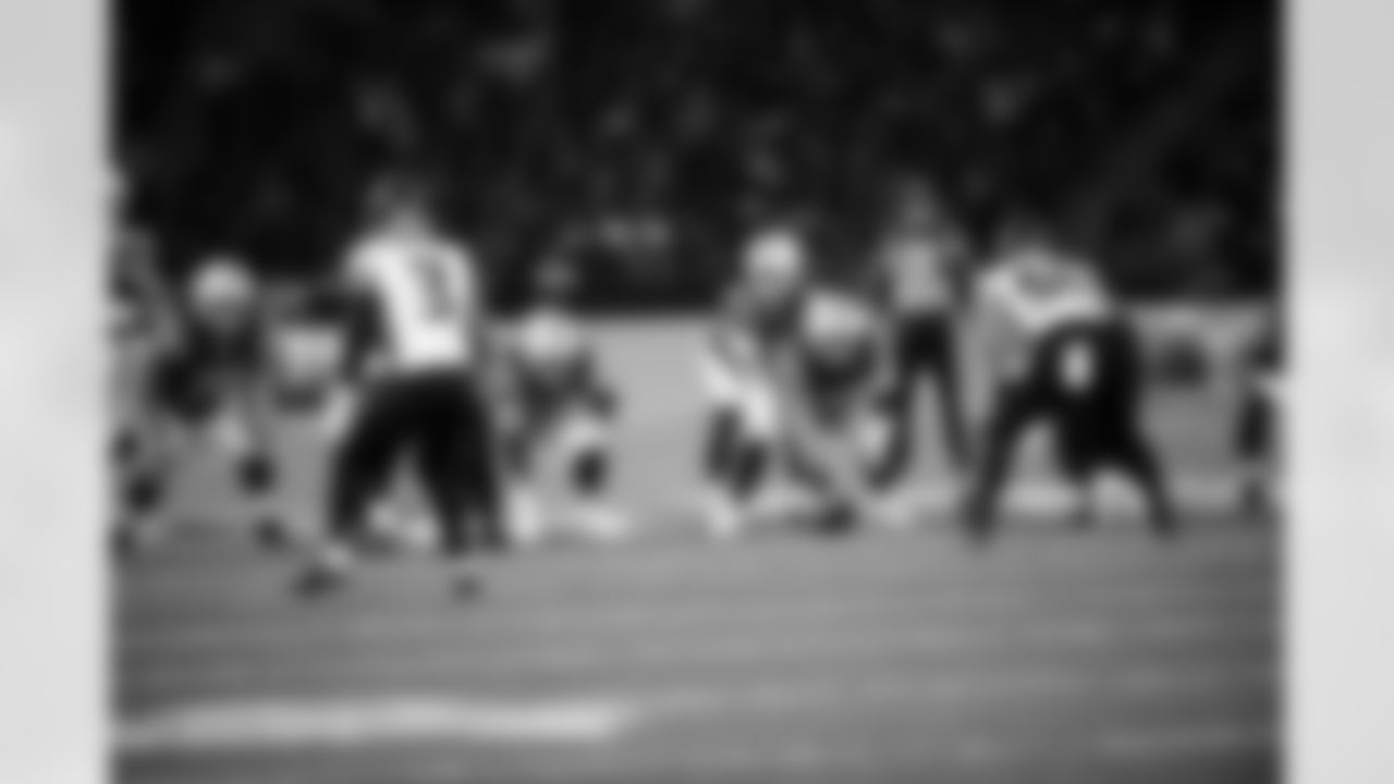 QB Daniel Jones #17 and G Tanor Bortolini #60