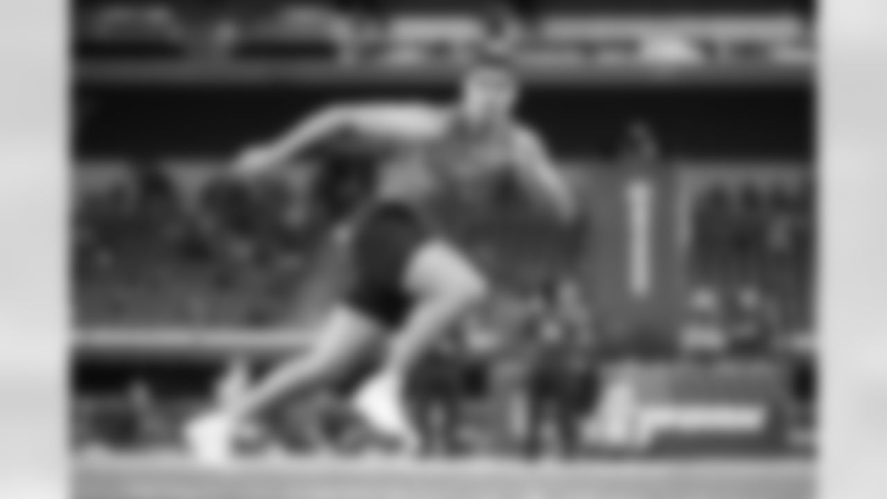 UCLA defensive lineman Laiatu Latu runs a drill at the NFL football scouting combine, Thursday, Feb. 29, 2024, in Indianapolis. (AP Photo/Michael Conroy)