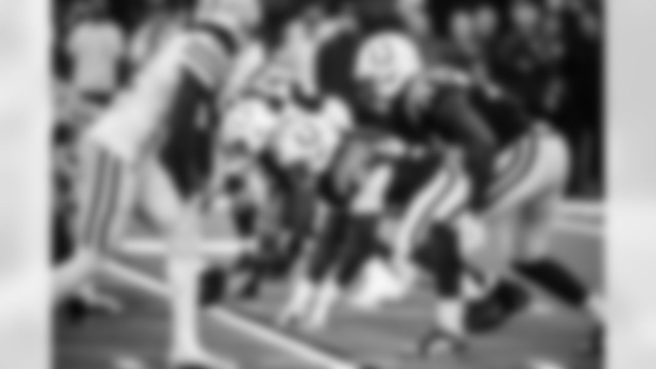 DE Durell Nchami #74 and DT Eric Johnson II #98