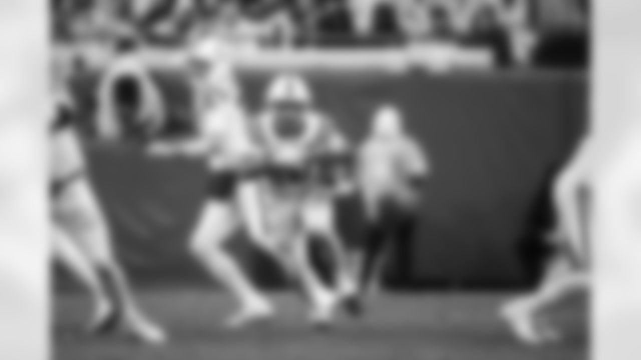 QB Riley Leonard #15 and RB Jonathan Taylor #28