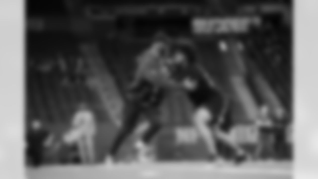 Utah offensive lineman Spencer Fano (22) participates in a drill during the 2026 NFL Scouting Combine on Sunday, March 1, 2026 in Indianapolis, Indiana. (Cooper Neill/NFL)