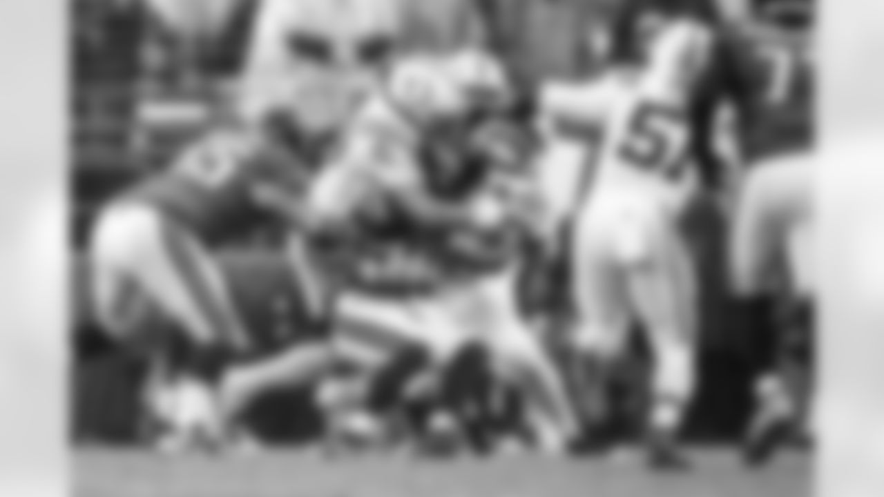 DT Grover Stewart #90 and LB Germaine Pratt #53