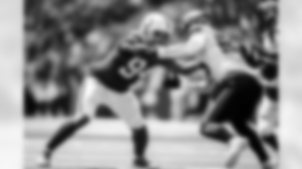 94 DE Tyquan Lewis
