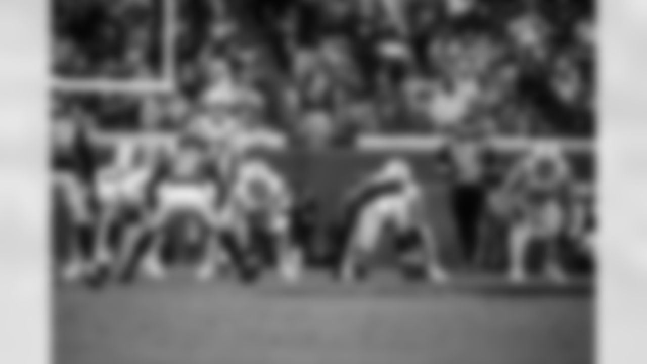 QB Daniel Jones #17 and G Tanor Bortolini #60