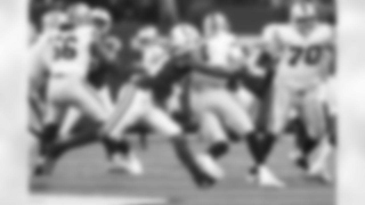 94 DE Tyquan Lewis