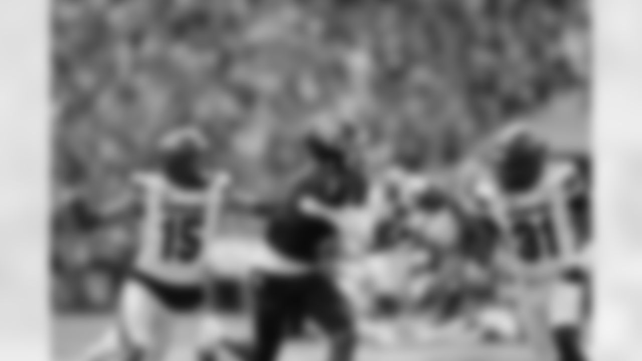 Texas A&M wide receiver KC Concepcion (7) catches a pass as South Carolina's Brandon Cisse (15) and Peyton Williams (31) defend during the first half of an NCAA college football game Saturday, Nov. 15, 2025, in College Station, Texas. (AP Photo/David J. Phillip)