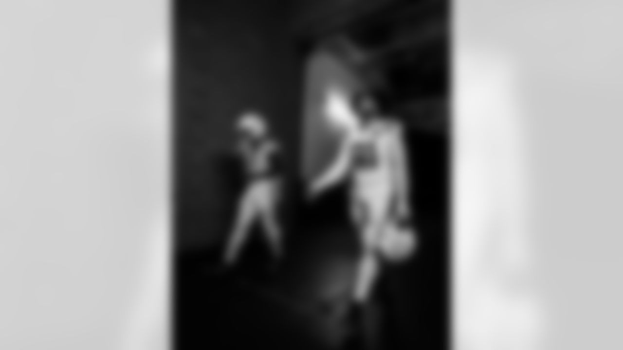 WR Ashton Dulin #16 and DE JT Tuimoloau #91