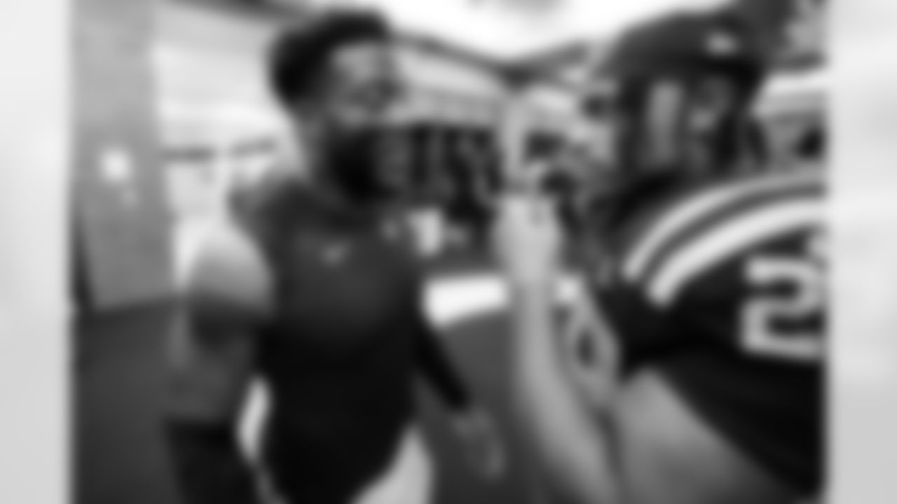 LB Zaire Franklin #44 and RB Jonathan Taylor #28