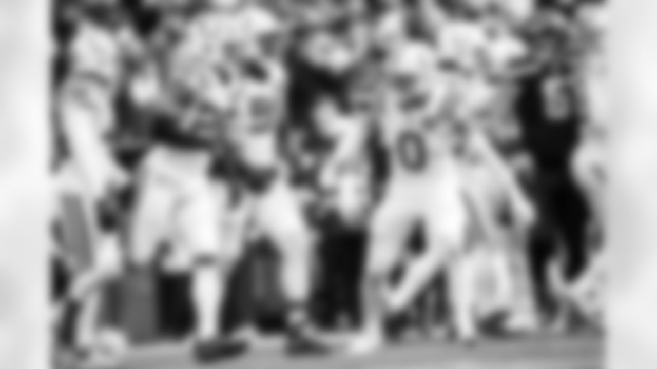 S Camryn Bynum #0 and S Nick Cross #20