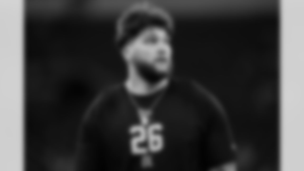 Oregon offensive lineman Alex Harkey (26) participates in a drill during the 2026 NFL Scouting Combine on Sunday, March 1, 2026 in Indianapolis, Indiana. (Cooper Neill/NFL)