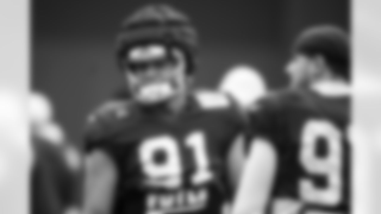 DE JT Tuimoloau #91 and DE Laiatu Latu #97