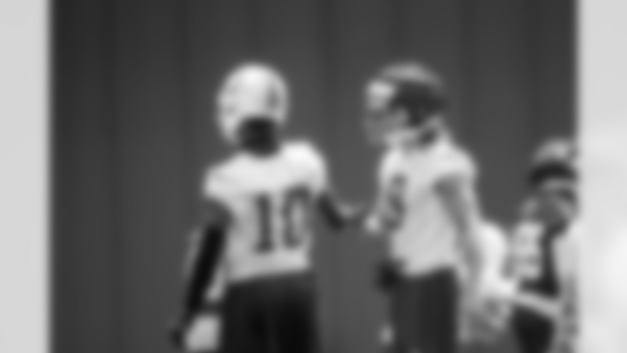 WR Adonai Mitchell #10 and Landon Parker