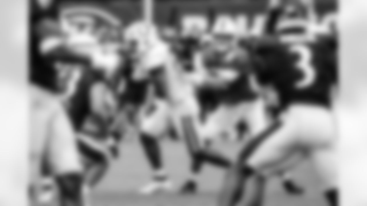 RB DJ Giddens #21 and QB Daniel Jones #17