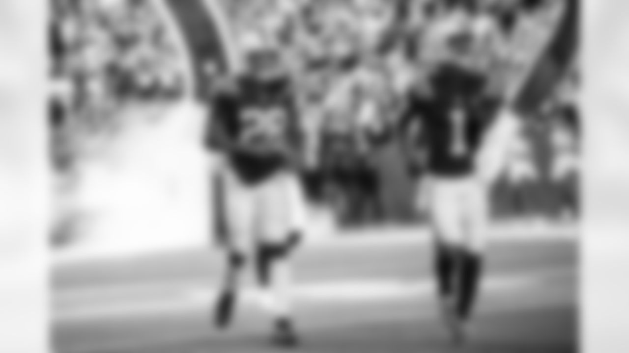RB Jonathan Taylor #28 and WR Josh Downs #1