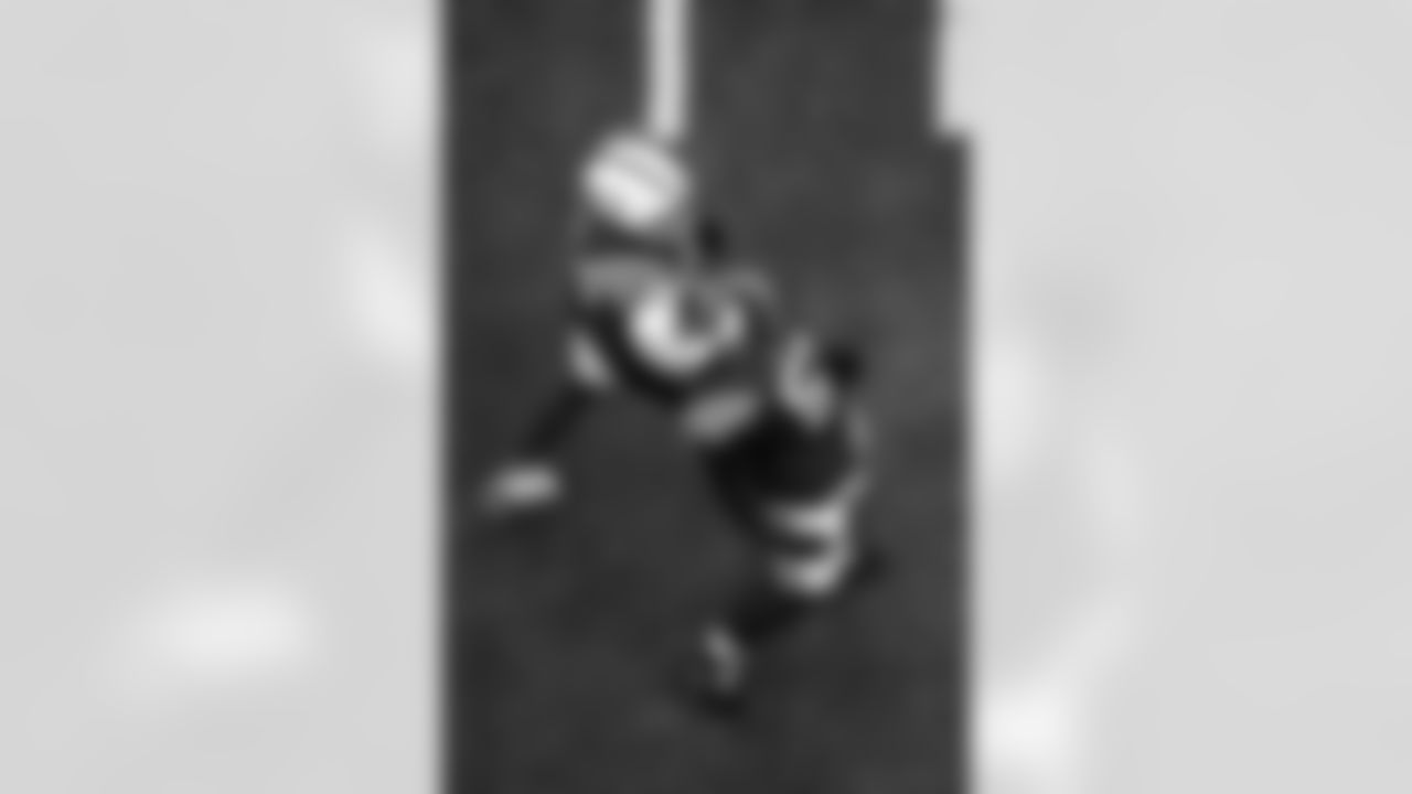 DL Tyquan Lewis #94 and DE Kwity Paye #51