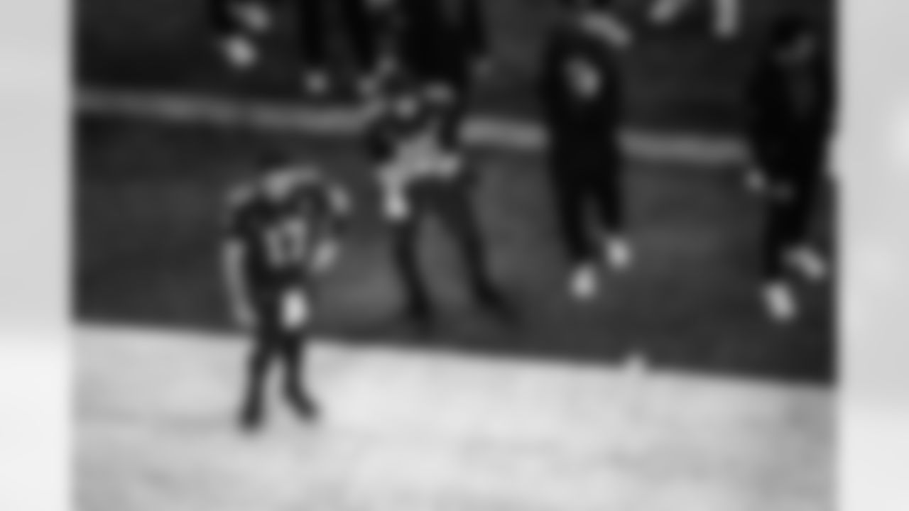 QB Philip Rivers #17 and QB Riley Leonard #15