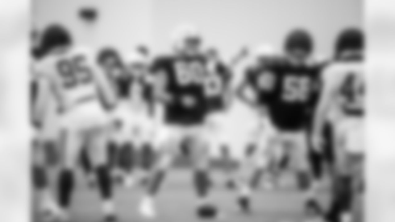 G Tanor Bortolini #60 and G Quenton Nelson #56