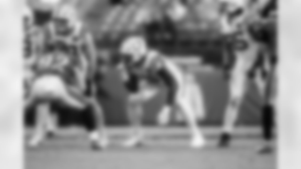 T Bernhard Raimann #79 and TE Mo Alie-Cox #81