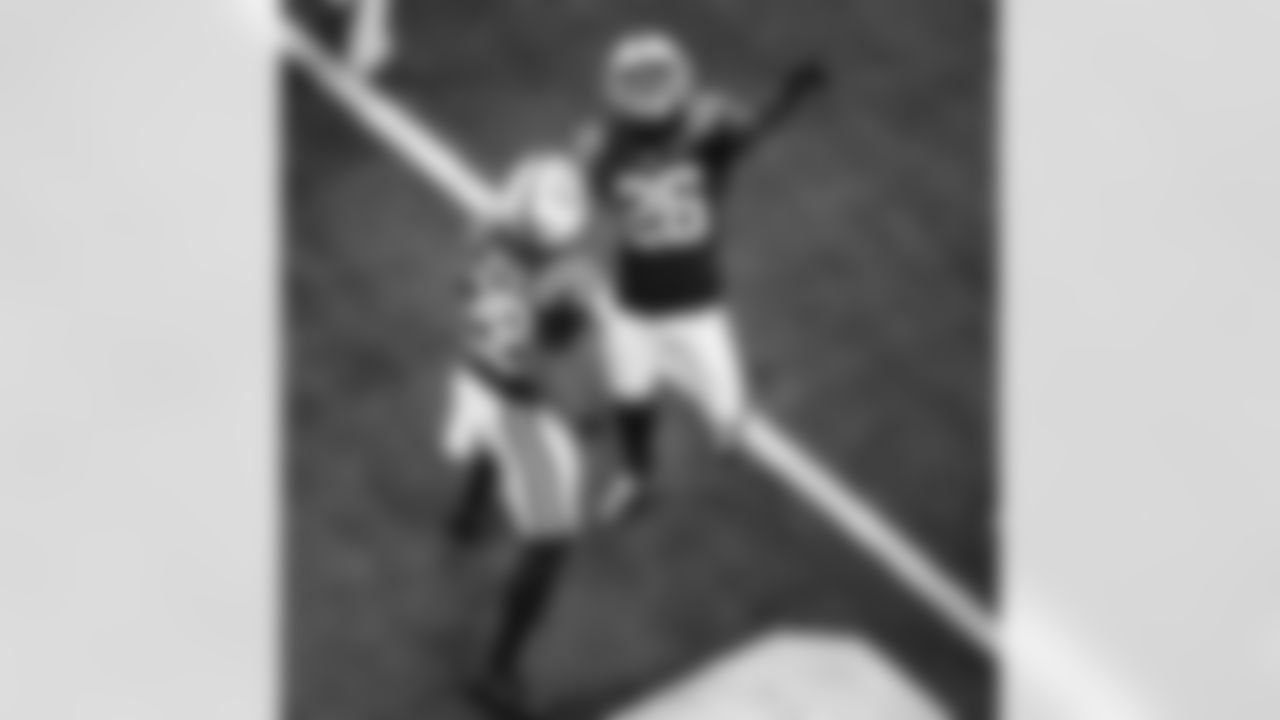 RB Jonathan Taylor #28 and RB Ameer Abdullah #26