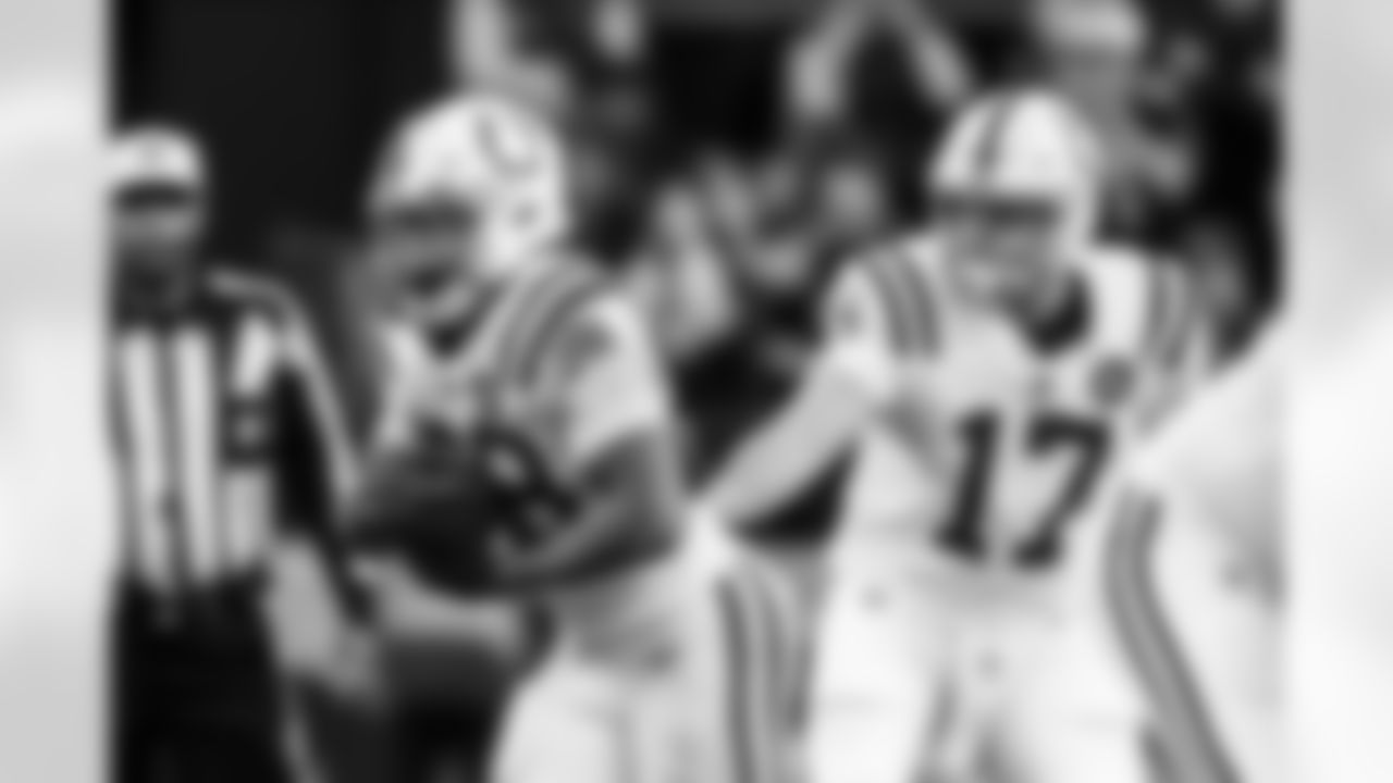 RB Jonathan Taylor #28 and QB Philip Rivers #17