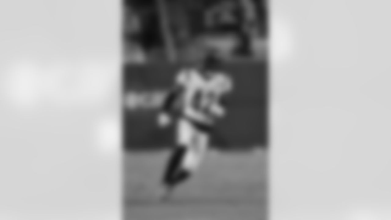 Cincinnati Bengals cornerback Allan George (42) runs toward the play during an NFL football game against the Tampa Bay Buccaneers, Sunday, Dec. 18, 2022, in Tampa, Fla. The Bengals defeated the Buccaneers 34-23. (Margaret Bowles via AP)