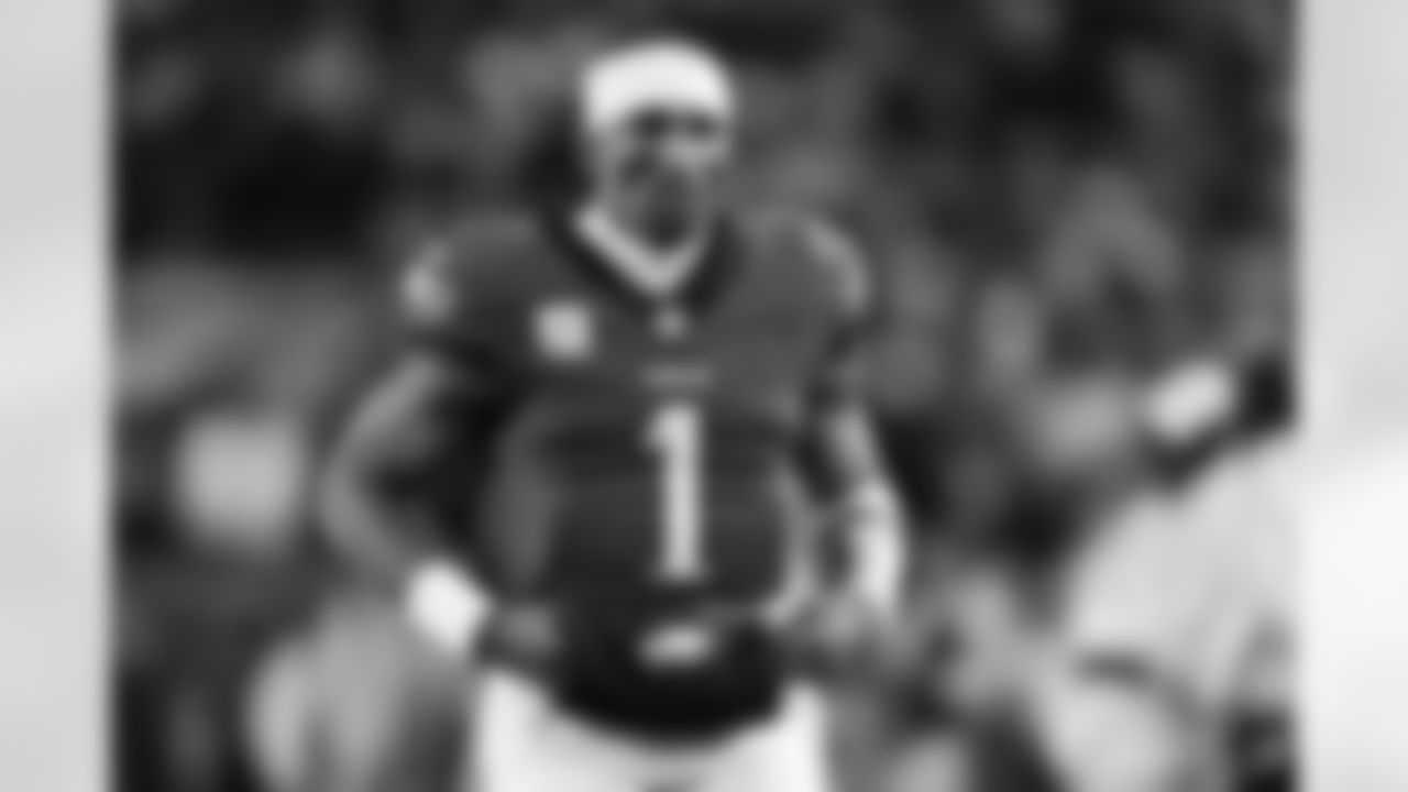 Philadelphia Eagles quarterback Jalen Hurts (1) warms up prior to an NFL football game against the Washington Commanders, Thursday, Nov. 14, 2024, in Philadelphia. (Cooper Neill via AP)