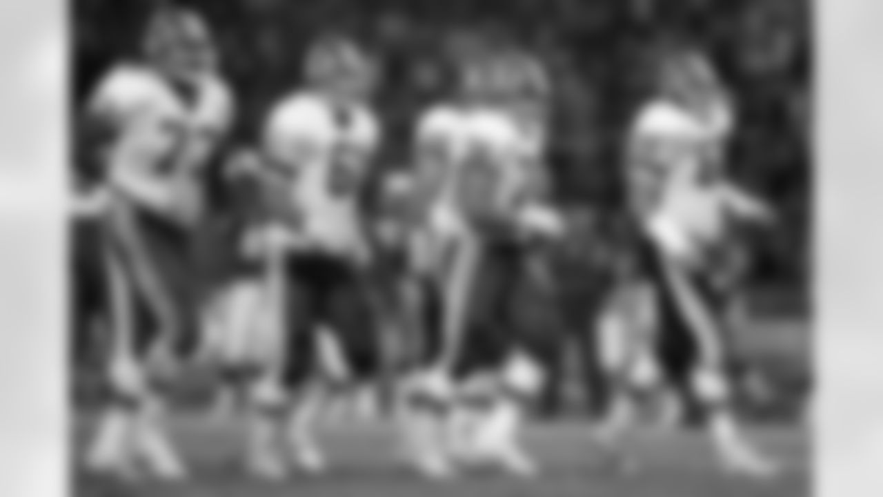Washington Redskins offensive tackle Mark May (73), guard Ken Huff (61), center Rick Donnelley (76), guard Russ Grimm (68), and Joe Jacoby (66) move to the line during an NFL football game against the St. Louis Cardinals, Oct 7, 1985 in Washington, D.C. The Redskins won 27-10. (Paul Spinelli via AP)
