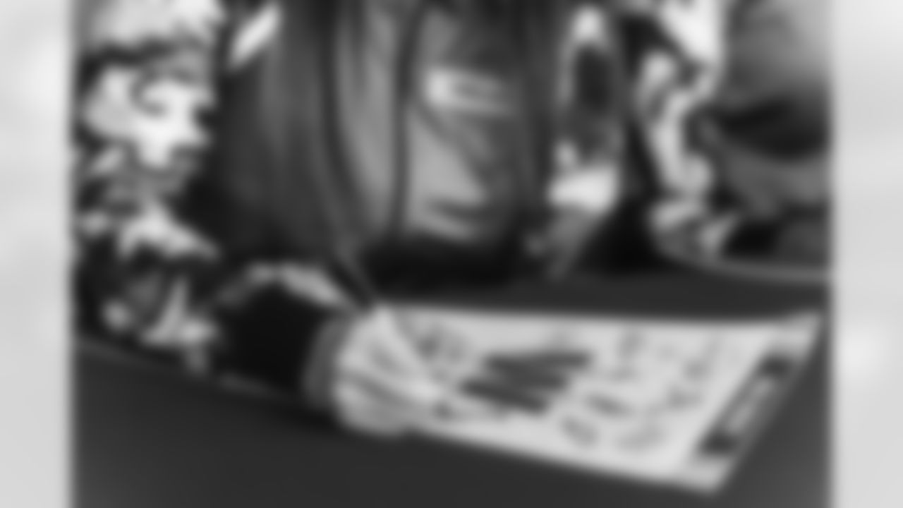 Images of Commander players and Command Force visiting Arlington National Cemetery with the USAA event staff at Fort Myers on October 21, 2025 in Landover, MD (Photo by Taylor Sims for Washington Commanders)