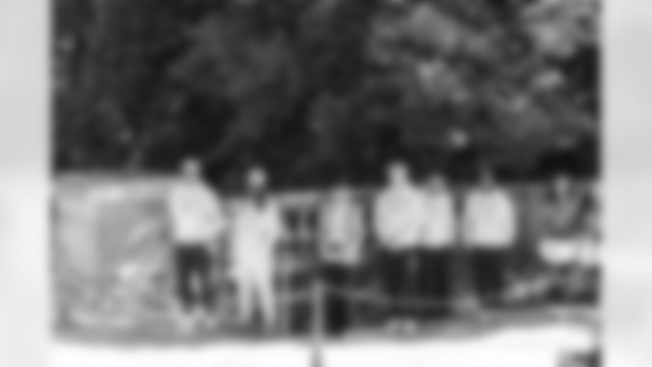 Images of Commander players and Command Force visiting Arlington National Cemetery with the USAA event staff at Fort Myers on October 21, 2025 in Landover, MD (Photo by Taylor Sims for Washington Commanders)