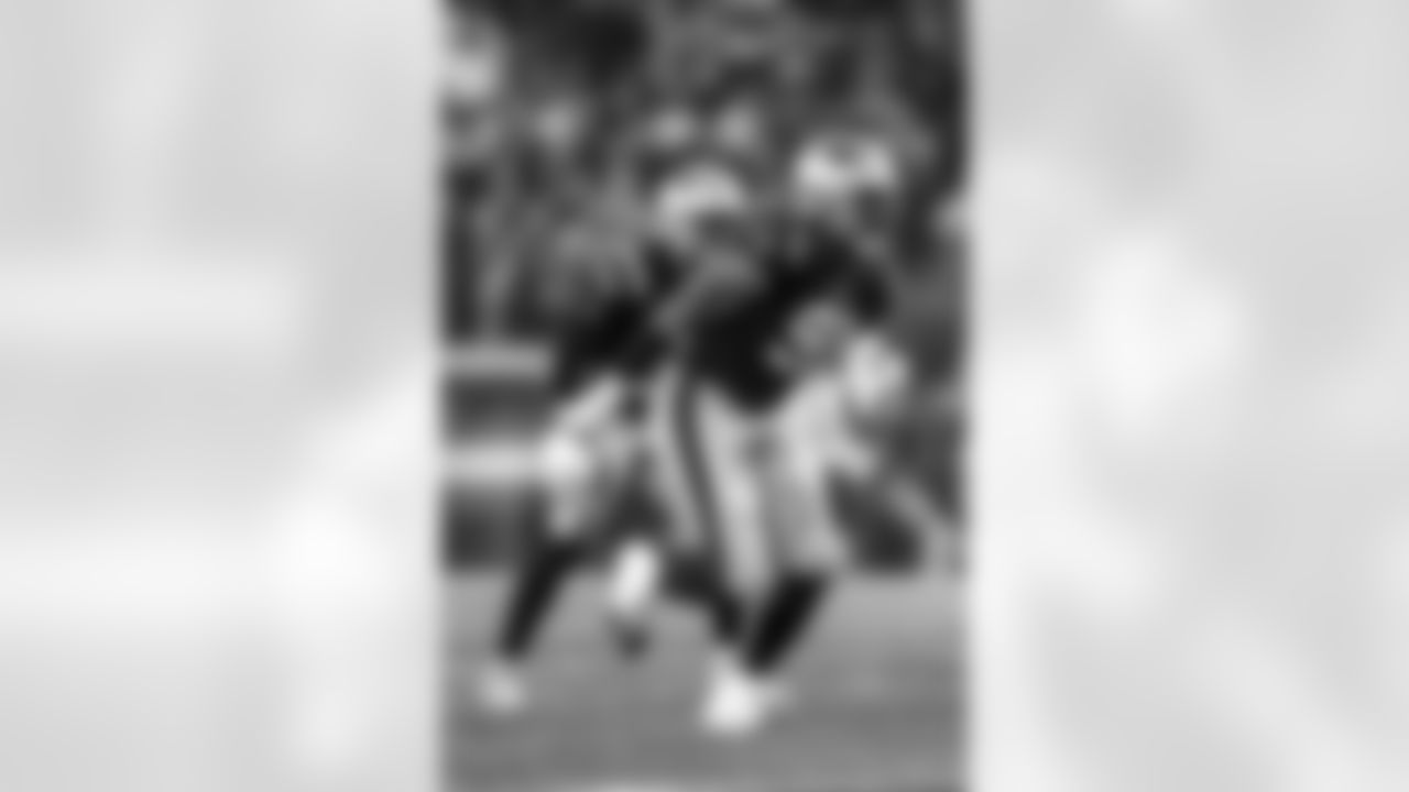 New England Patriots defensive lineman Deatrich Wise (91) rushes the line during an NFL football game against the Chicago Bears, Monday, Oct. 24,2022 in Foxborough, Mass. The Bears defeated the Patriots 33-14. (Damian Strohmeyer via AP)