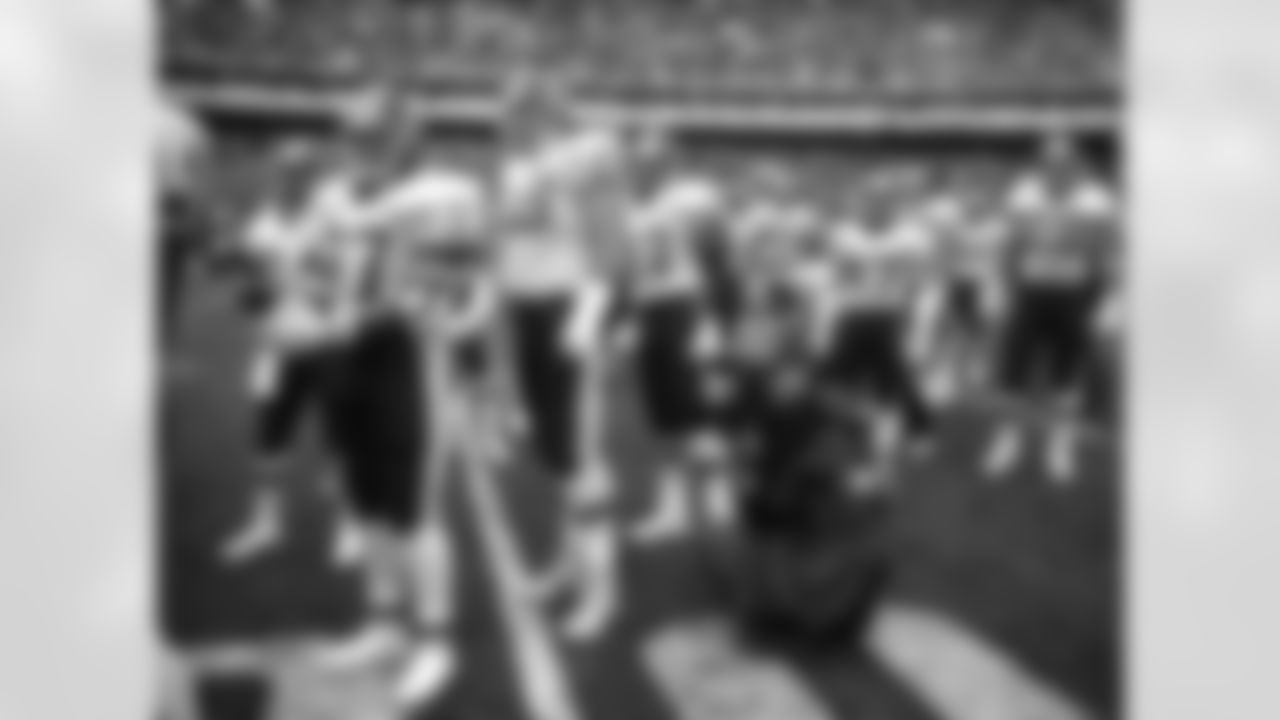 Washington Redskins running back Gerald Riggs (37) and tackle Joe Jacoby (66) wait to be introduced before the NFC Championship Game, a 41 - 10 victory over the Detroit Lions on January 12, 1992, at RFK Stadium in Washington, D.C. (AP Photo / Al Messerschmidt)