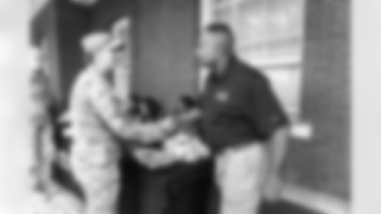 Images of Commander players and Command Force visiting Arlington National Cemetery with the USAA event staff at Fort Myers on October 21, 2025 in Landover, MD (Photo by Taylor Sims for Washington Commanders)