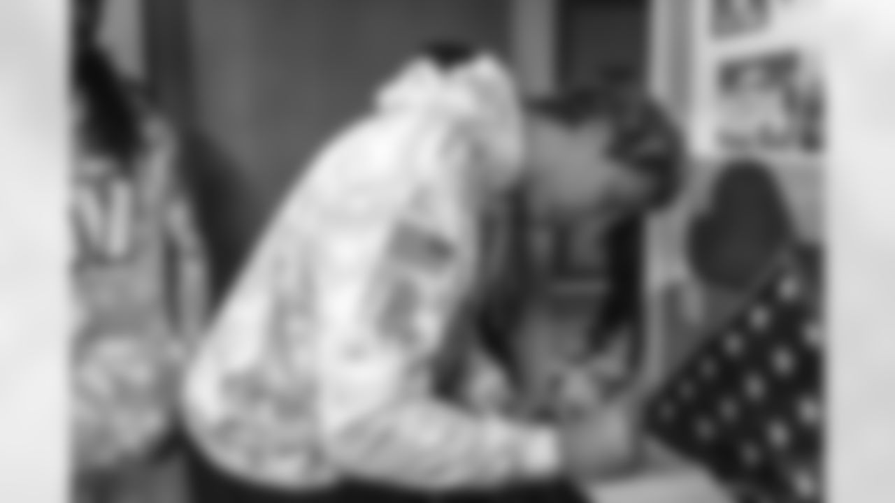 Images of Commander players and Command Force visiting Arlington National Cemetery with the USAA event staff at Fort Myers on October 21, 2025 in Landover, MD (Photo by Taylor Sims for Washington Commanders)