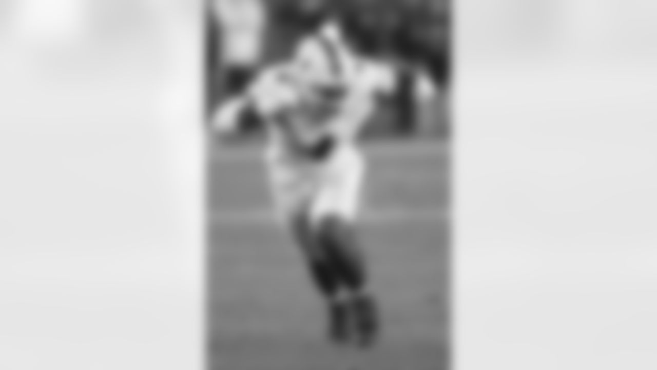 Miami defensive lineman Rueben Bain Jr. rushes the Mississippi quarterback during the second half of the Fiesta Bowl NCAA college football playoff semifinal game, Thursday, Jan. 8, 2026, in Glendale, Ariz. (AP Photo/Ross D. Franklin)