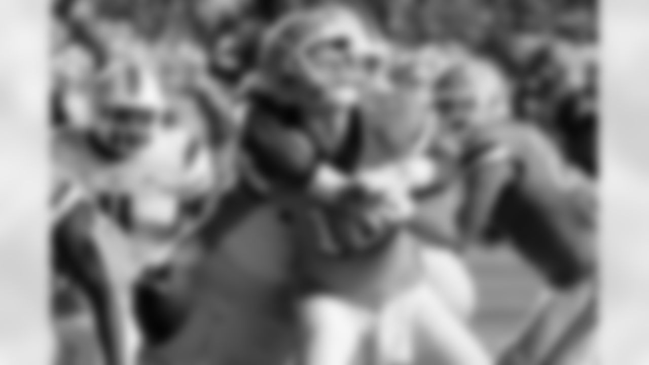 Miami defensive lineman Rueben Bain Jr. (44), back, hits North Carolina quarterback Drake Maye (10), causing him to fumble, during the first half an NCAA college football game Saturday, Oct. 14, 2023, in Chapel Hill, N.C. North Carolina recovered the ball. (AP Photo/Chris Seward)