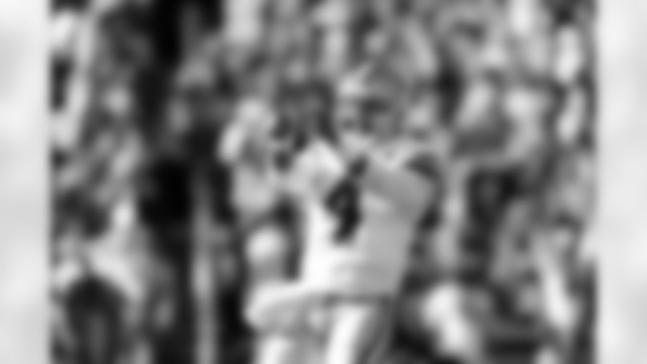Dallas Cowboys quarterback Dak Prescott (4) celebrates during an NFL football game against the Cleveland Browns, Sunday, Sept. 8, 2024, in Cleveland. The Cowboys defeated the Browns 33-17. (Aaron M. Sprecher via AP)